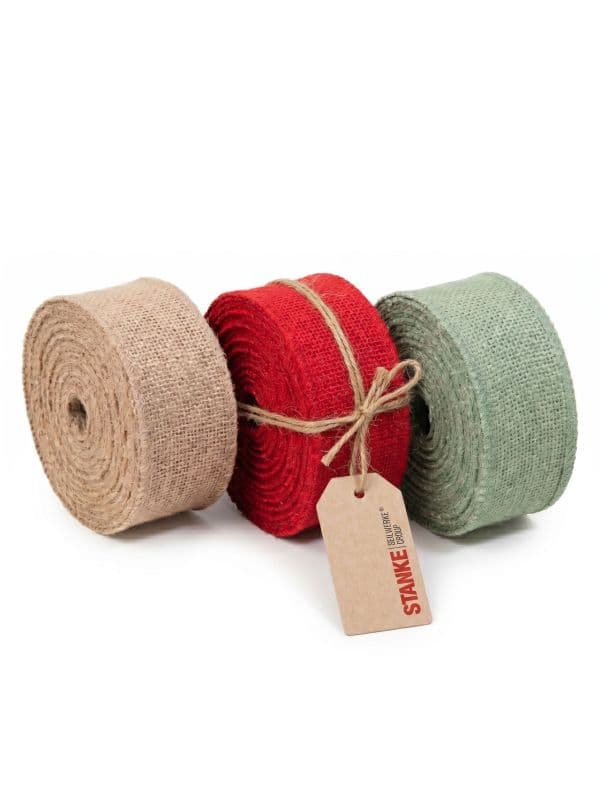 Lot de rubans en jute Seilwerk Stanke, 3 rouleaux en rouge, naturel et vert sur fond blanc. 